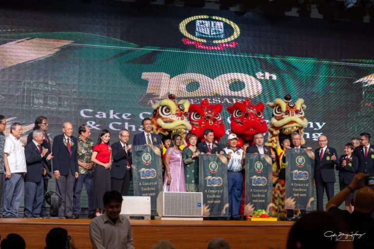 The 100th Anniversary cake ceremony, welcomed with a lion dance